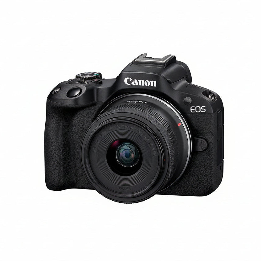 Canon EOS camera with lens on a white background