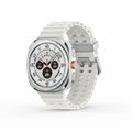 Samsung Watch Ultra 47mm Titanium White on a sandy beach with running shoes and sunglasses in frame.